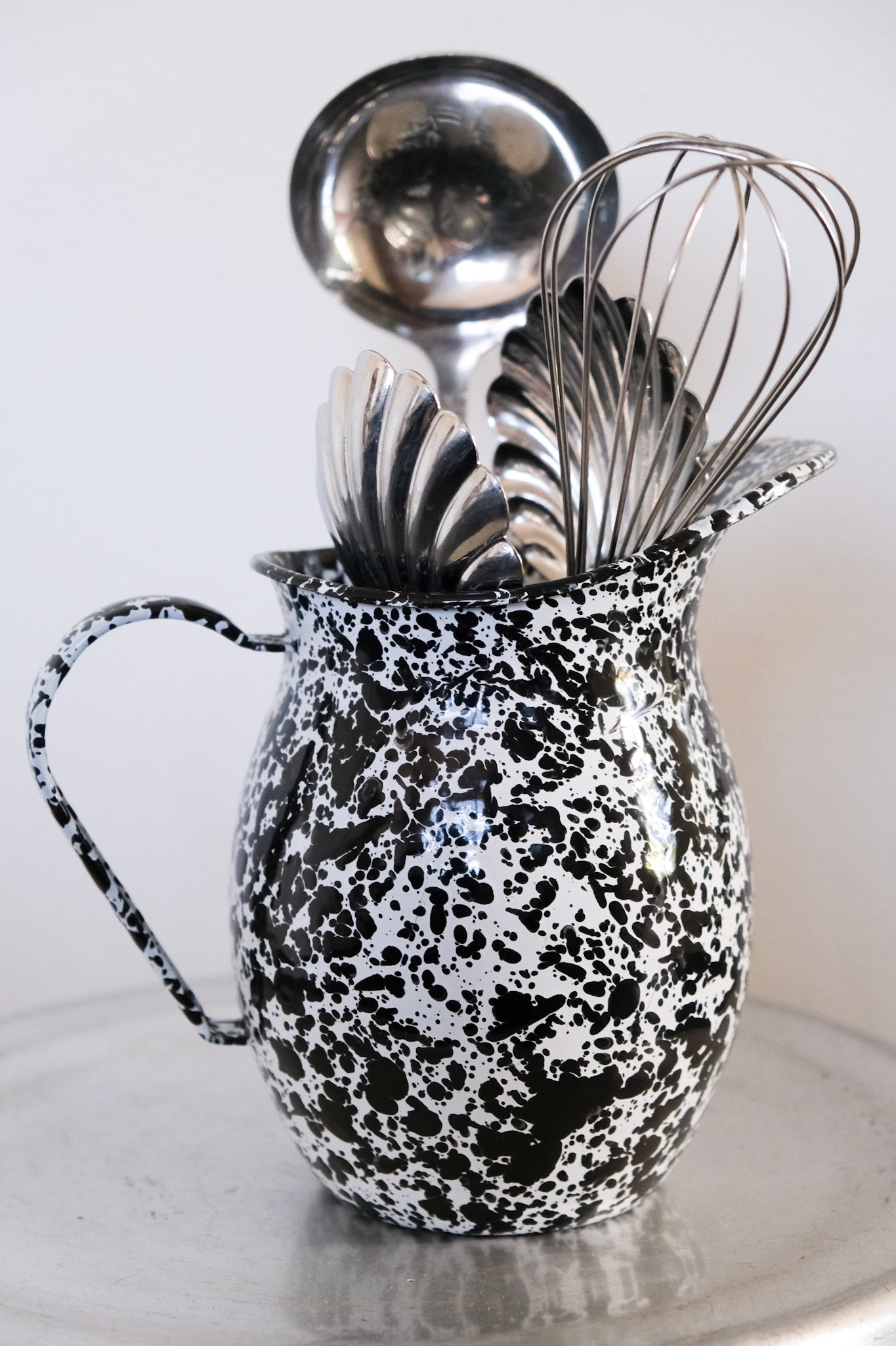 Splatter enamel pitcher