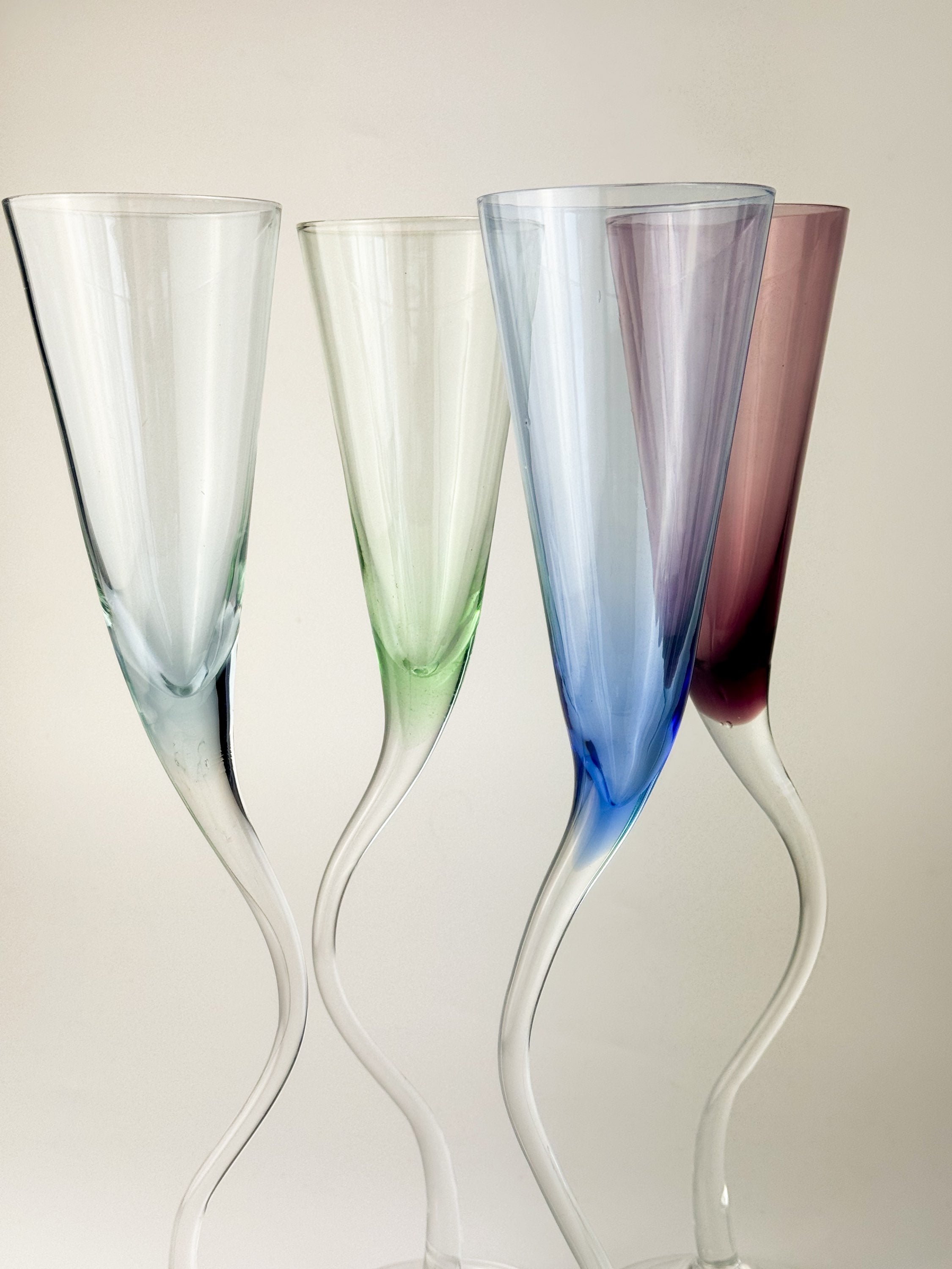 Set of four tall champagne flutes
