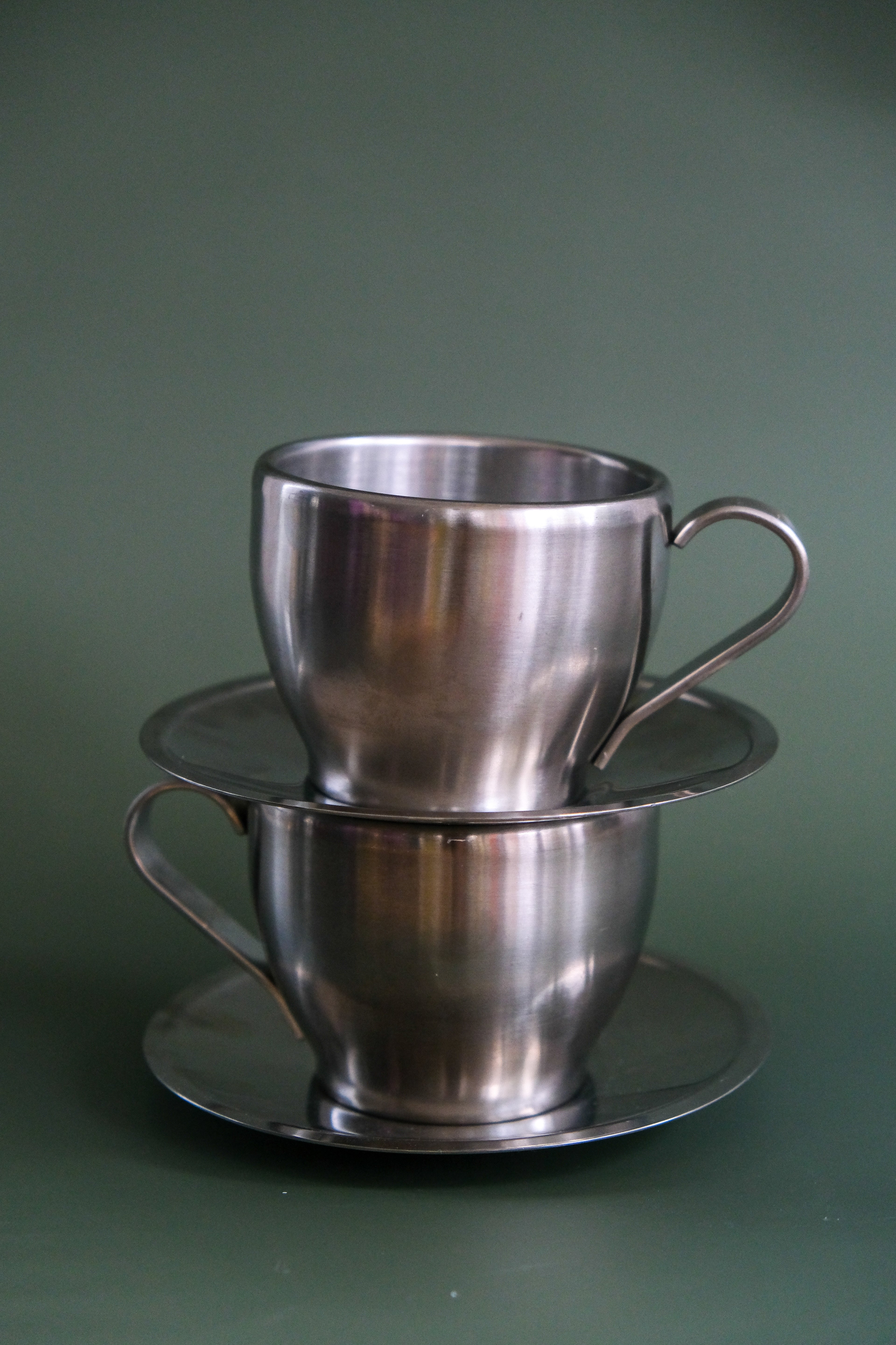 Set of inox cups & saucers