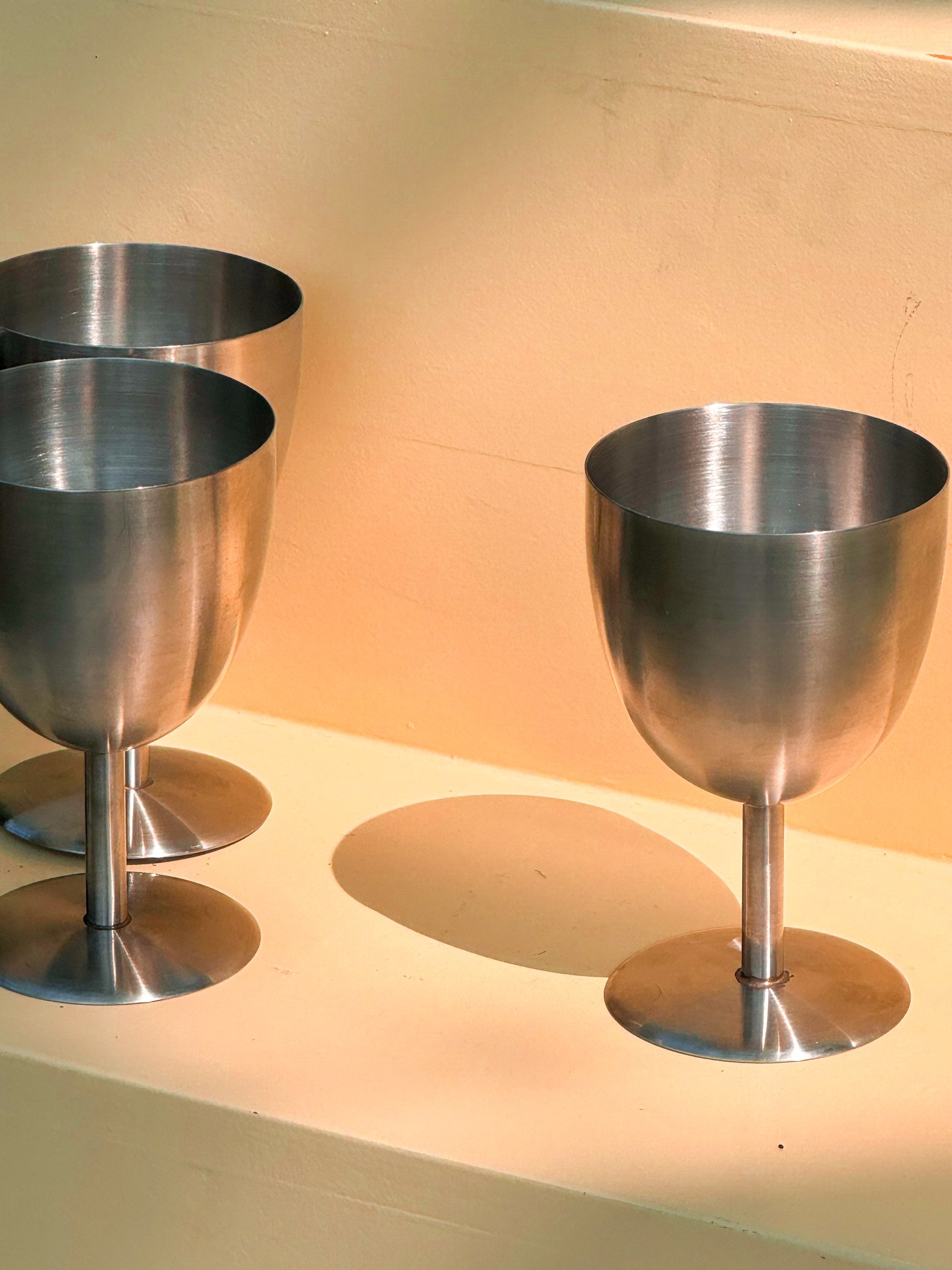 Set of four steel chalices