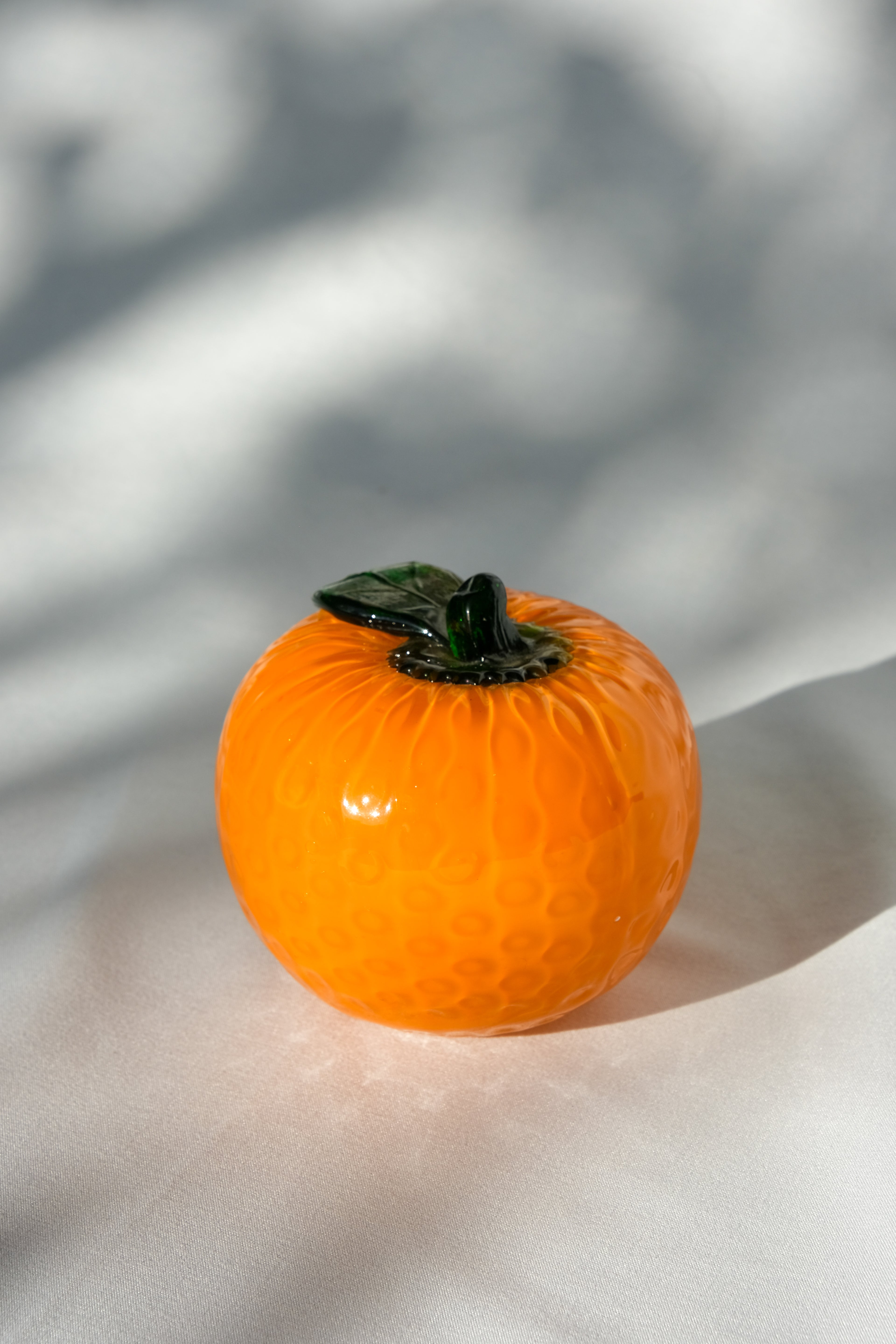 Glass orange sculpture