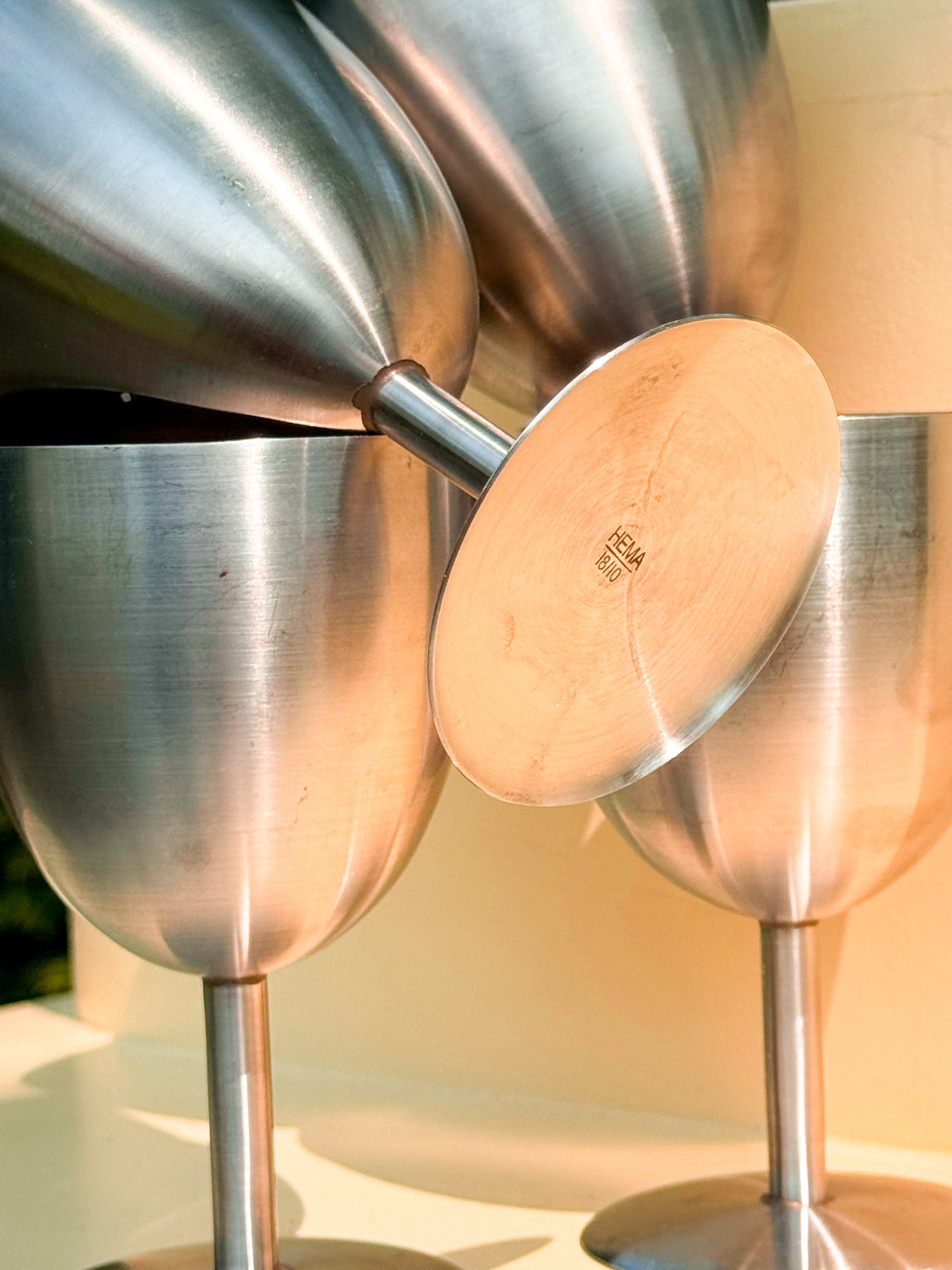 Set of four steel chalices