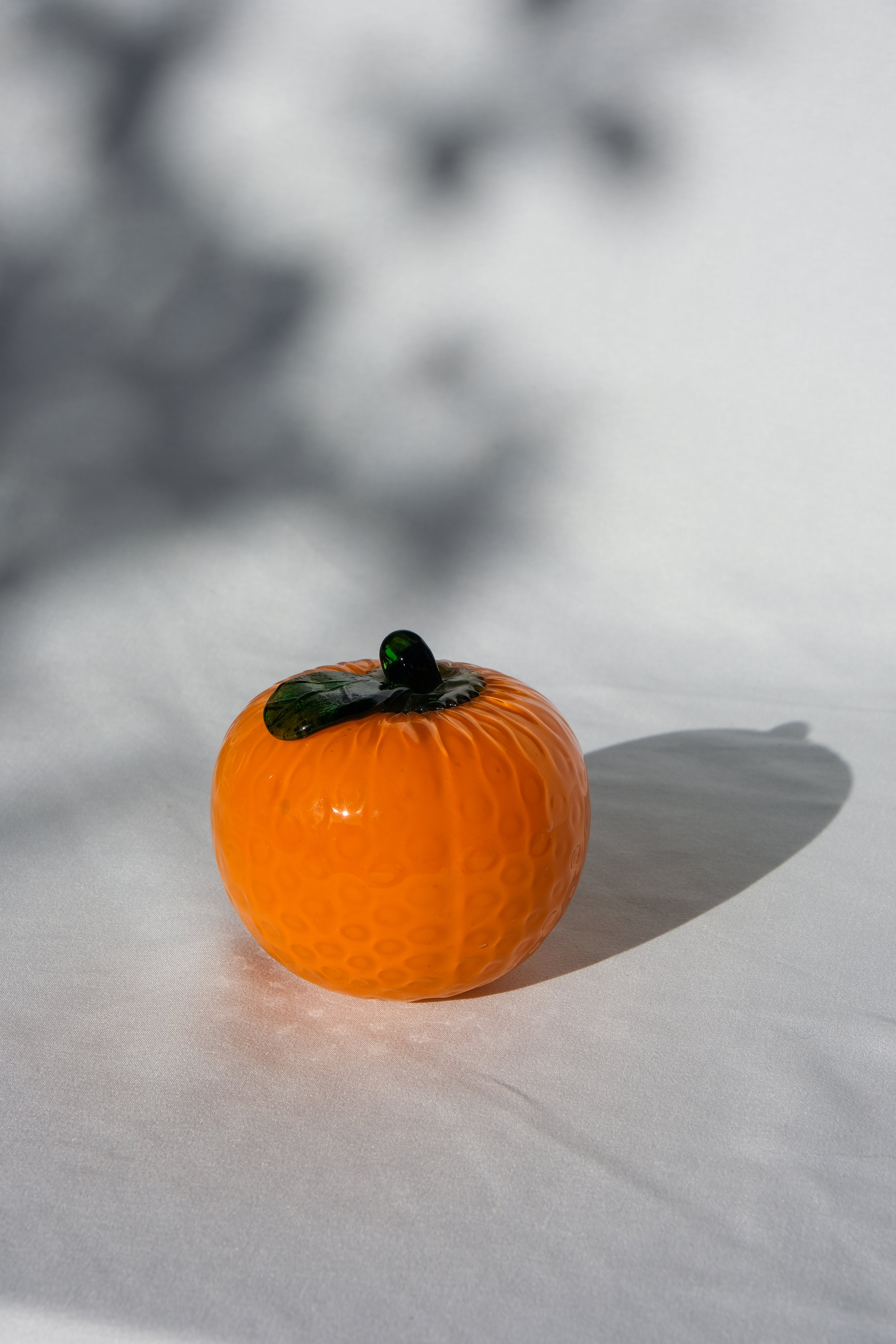 Glass orange sculpture