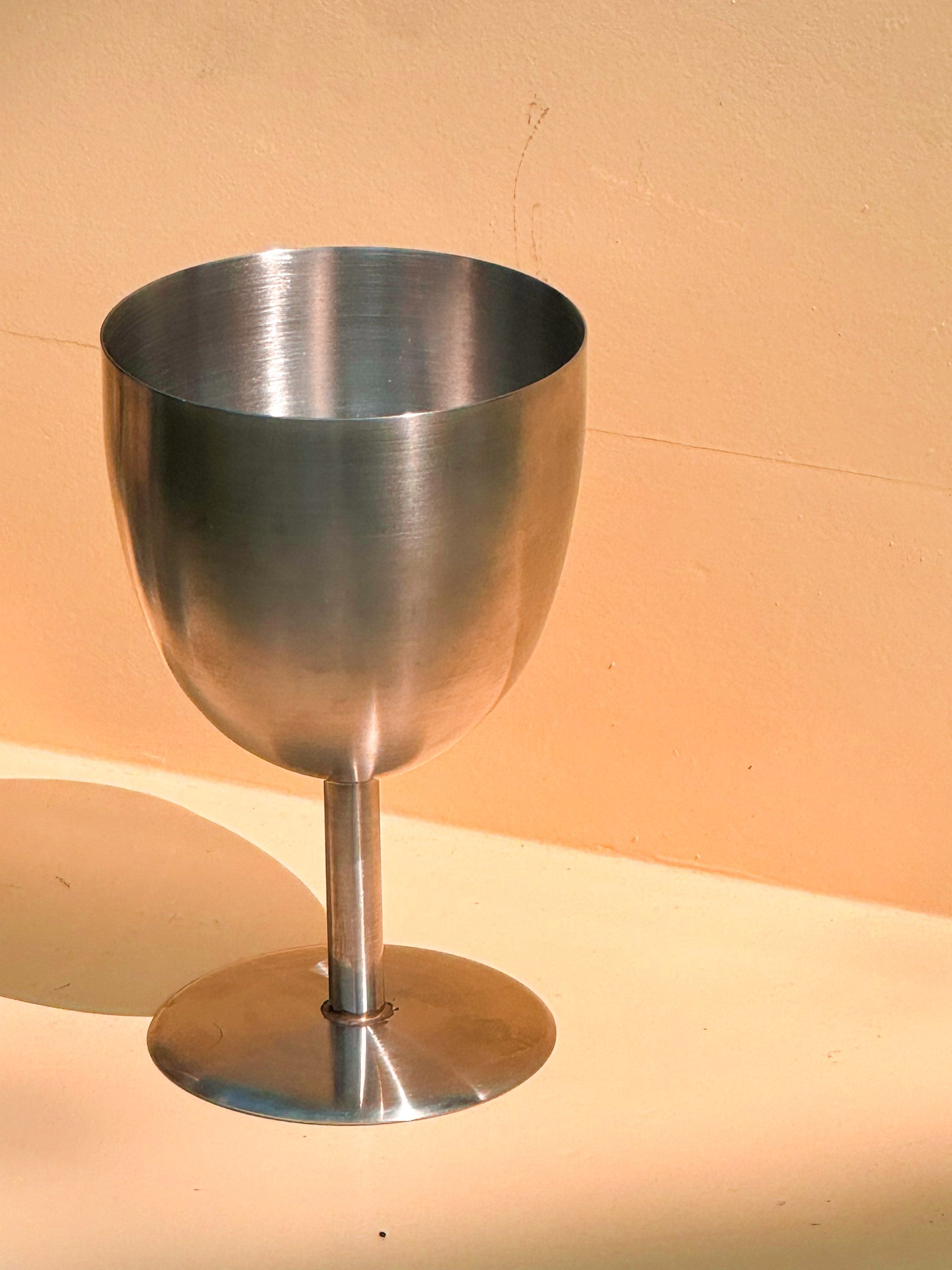 Set of four steel chalices