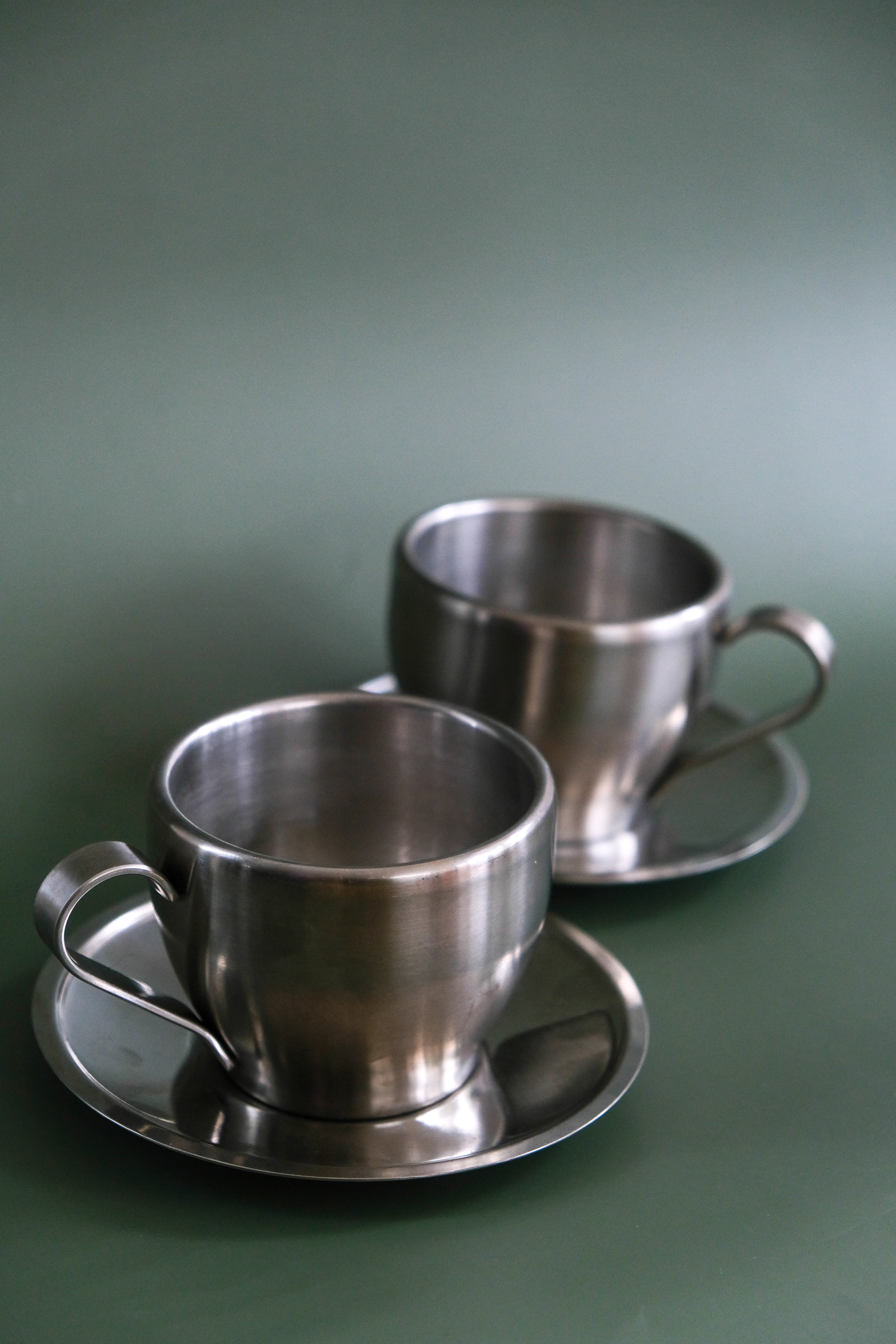 Set of inox cups & saucers