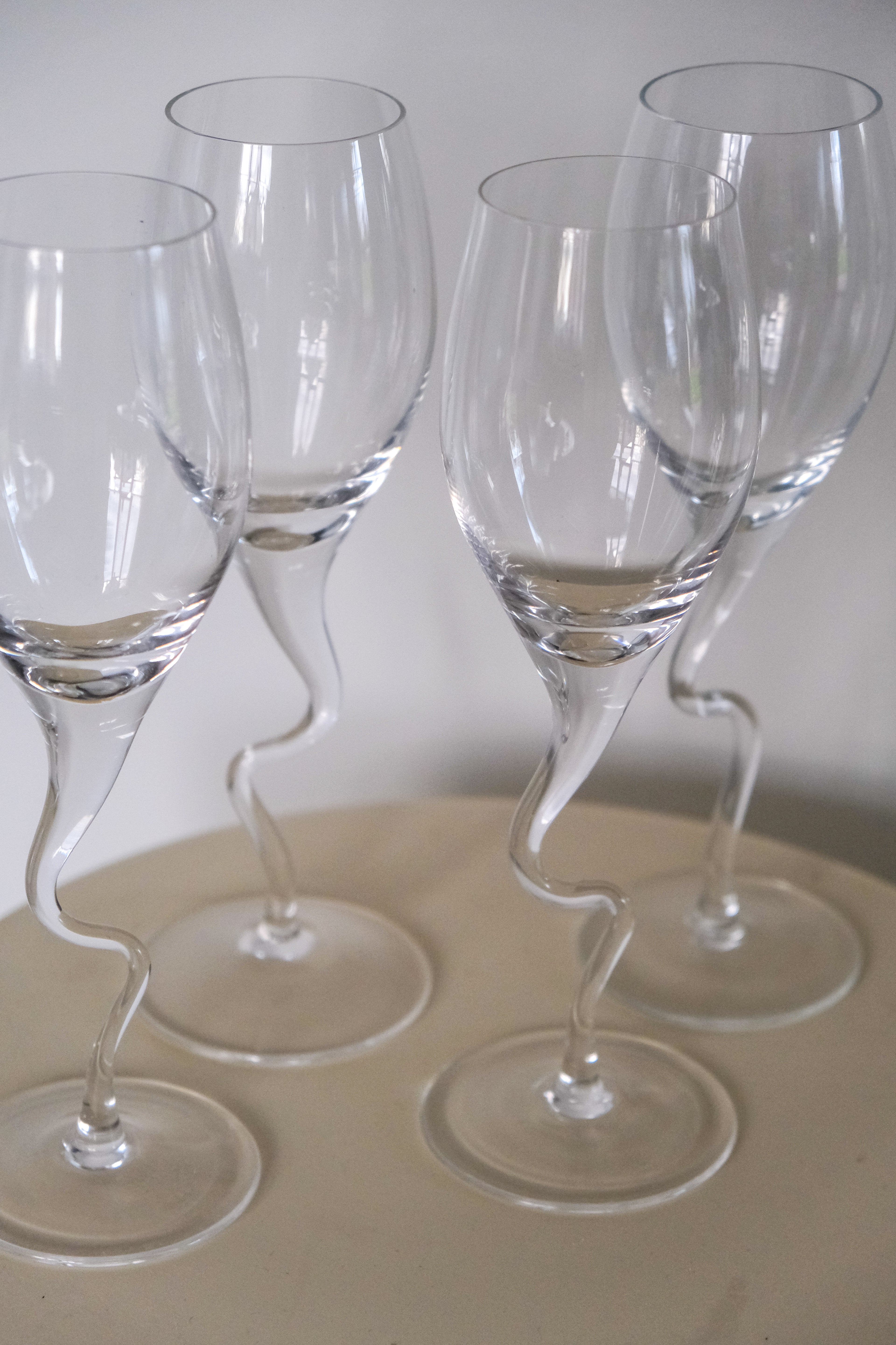 Set of four squiggly glasses