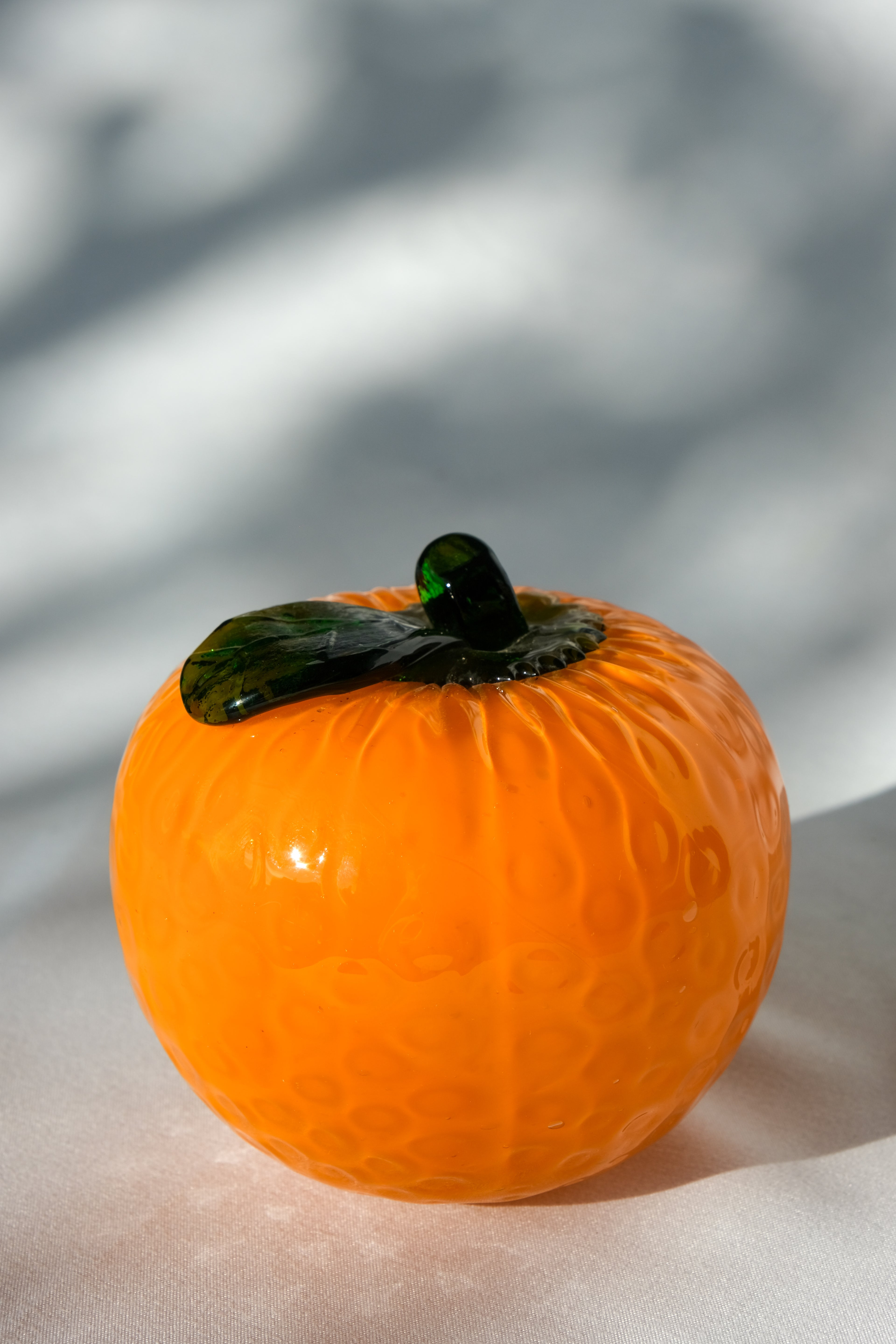 Glass orange sculpture