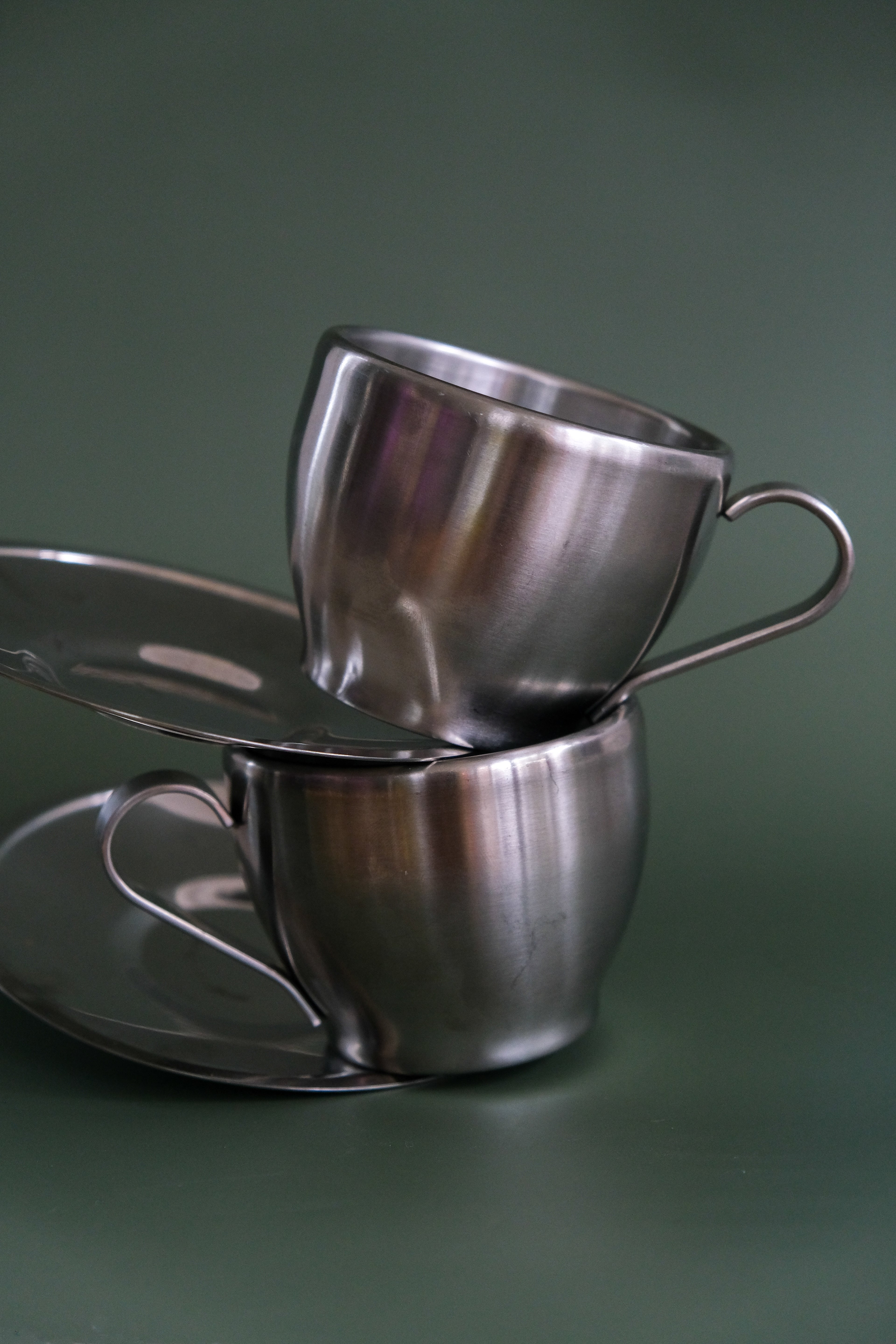 Set of inox cups & saucers