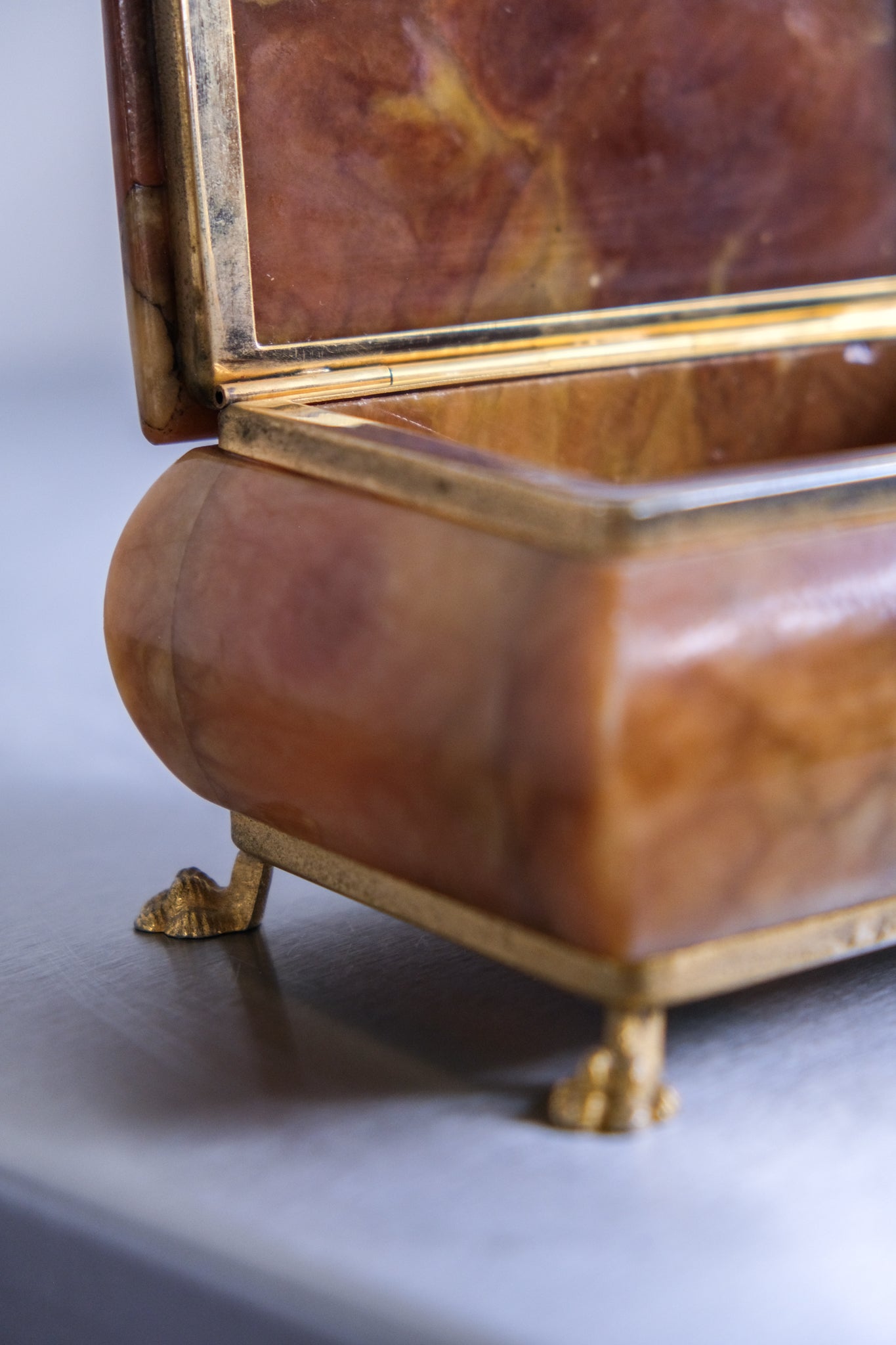 Alabaster box on lion paw feet