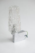 Textured glass wall sconce