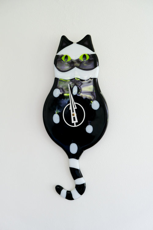 Glass cat clock