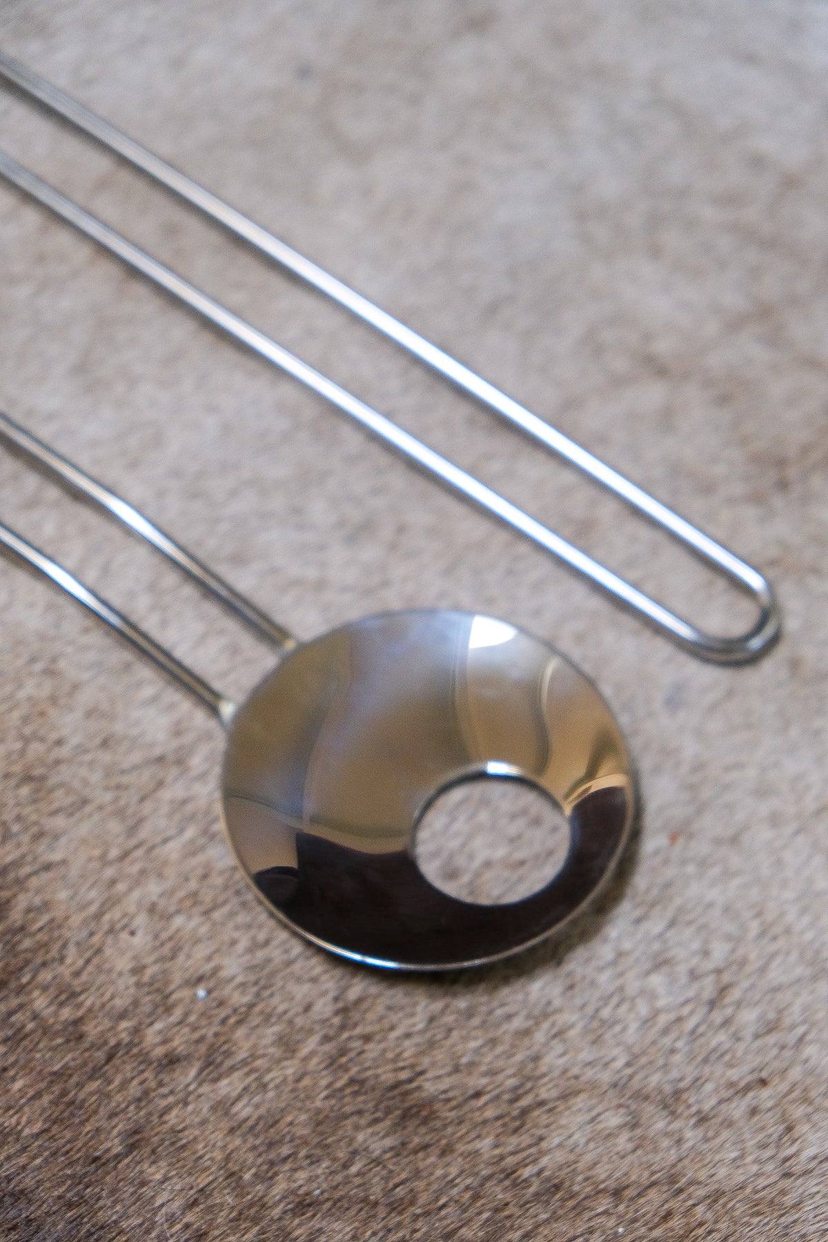 Modernist steel salad servers with wire handles