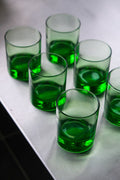 Set of six green tumbler glasses